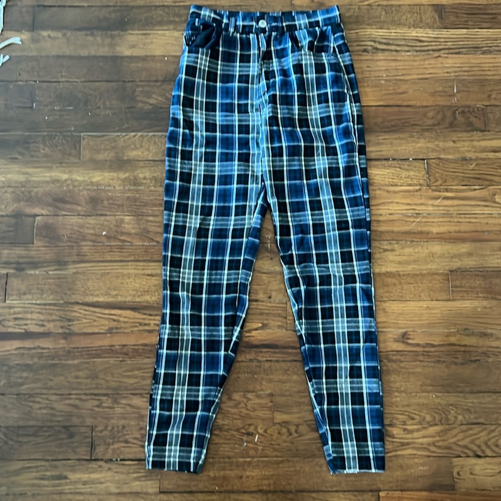 Blue black and white plaid pants, tight fitting, stops at ankles cotton